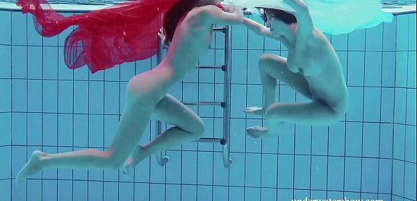  Two hotties naked in the pool